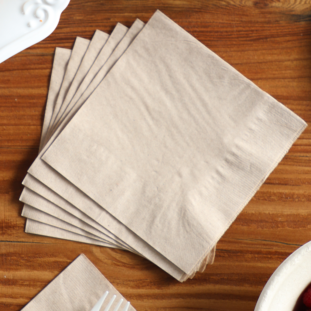 World Centric 5x5 Unbleached Beverage Napkin shown on table