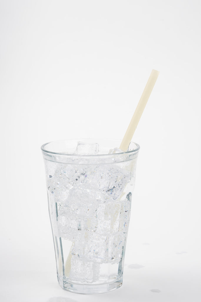 Biodegradable drinking straws shown in beverage