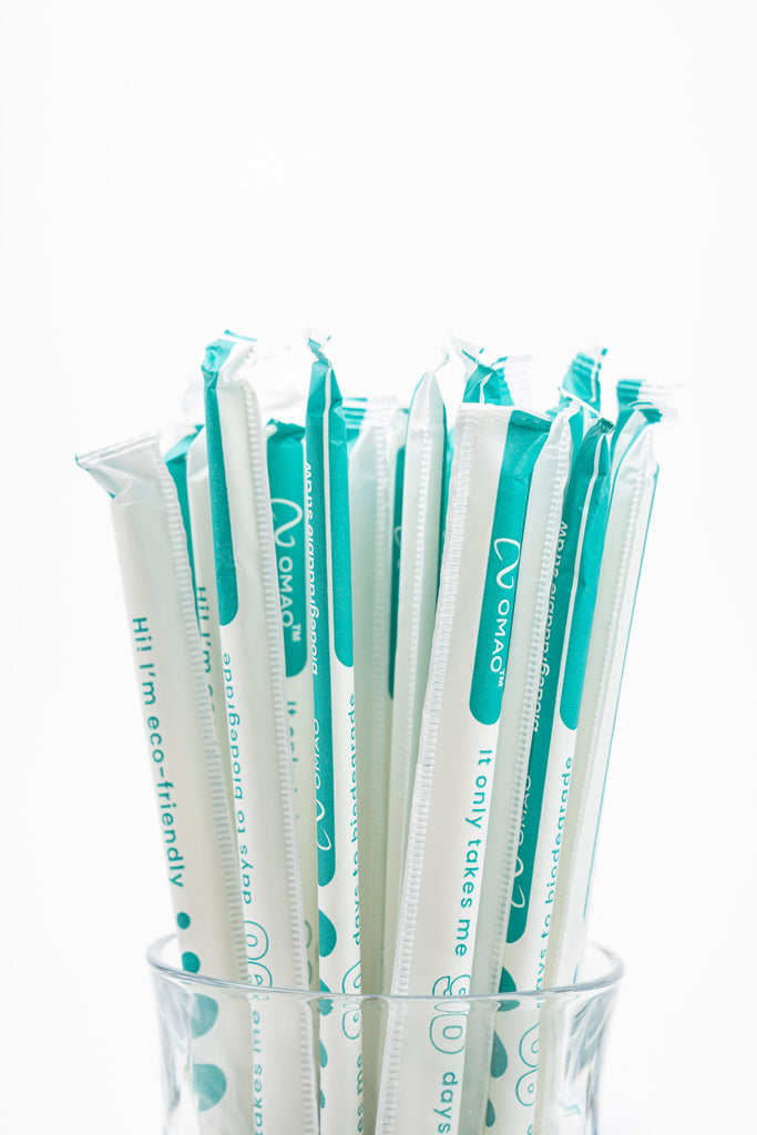 Biodegradable Individually Wrapped Drinking Straws shown in Glass