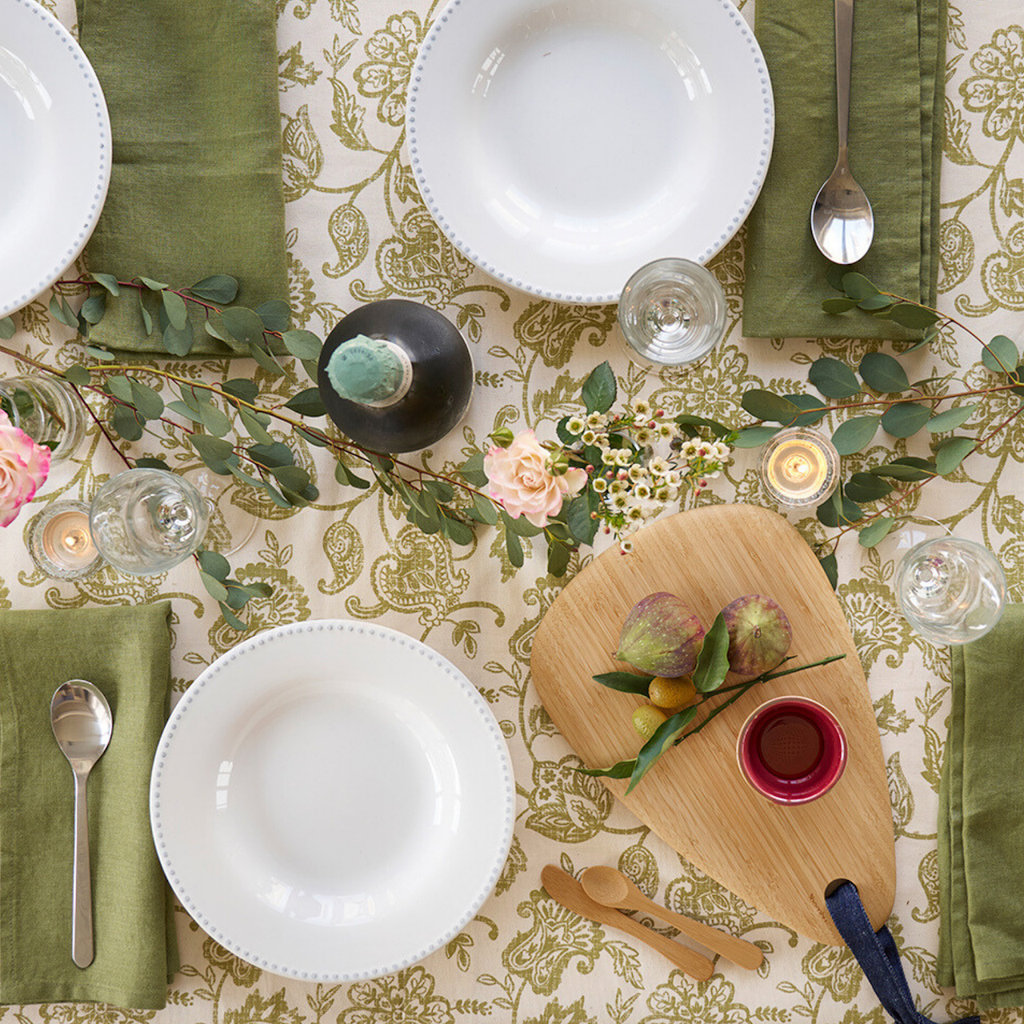 Organic Bamboo Droplet Board shown on Table