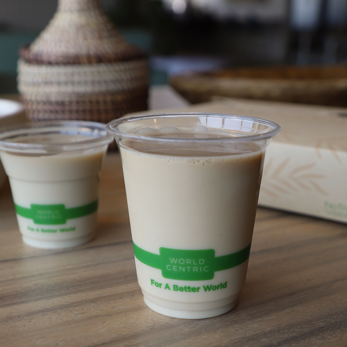 World Centric Compostable PLA 7 oz Clear Cold Cup shown with Iced Coffee.