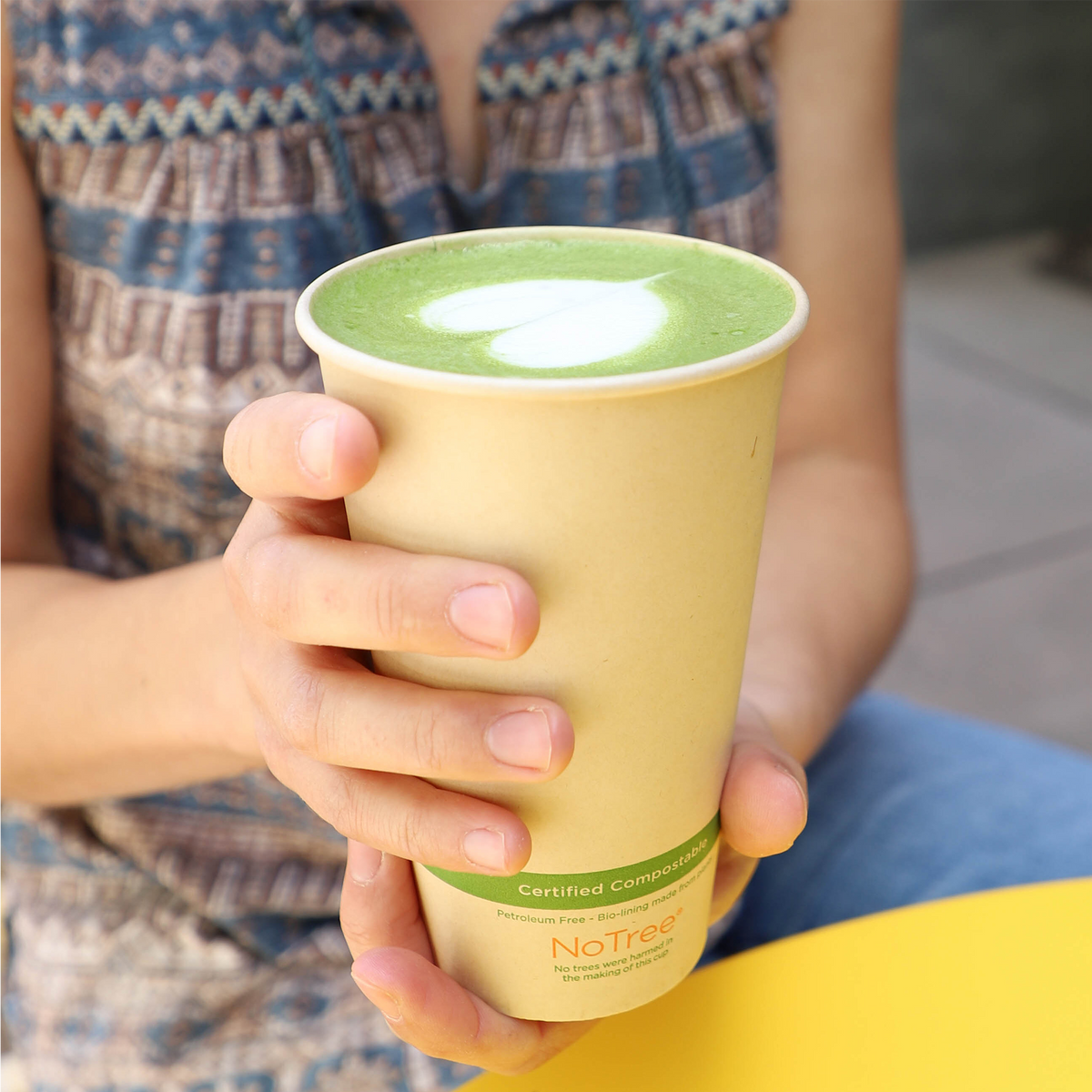 World Centric Compostable 16 oz NoTree Paper Hot Cup shown with Tea.