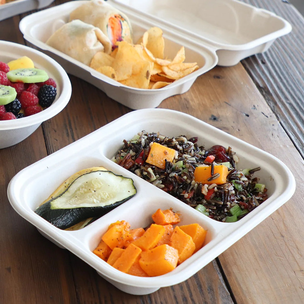 World Centric Compostable Fiber 3-Compartment Container shown with dinner.