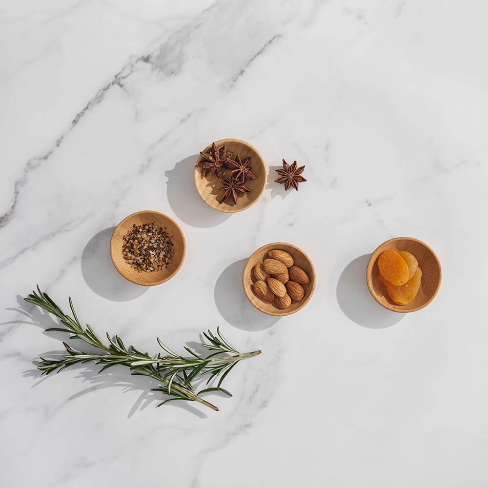 Organic Bamboo Mini Condiment Cups, set of four, shown with spices